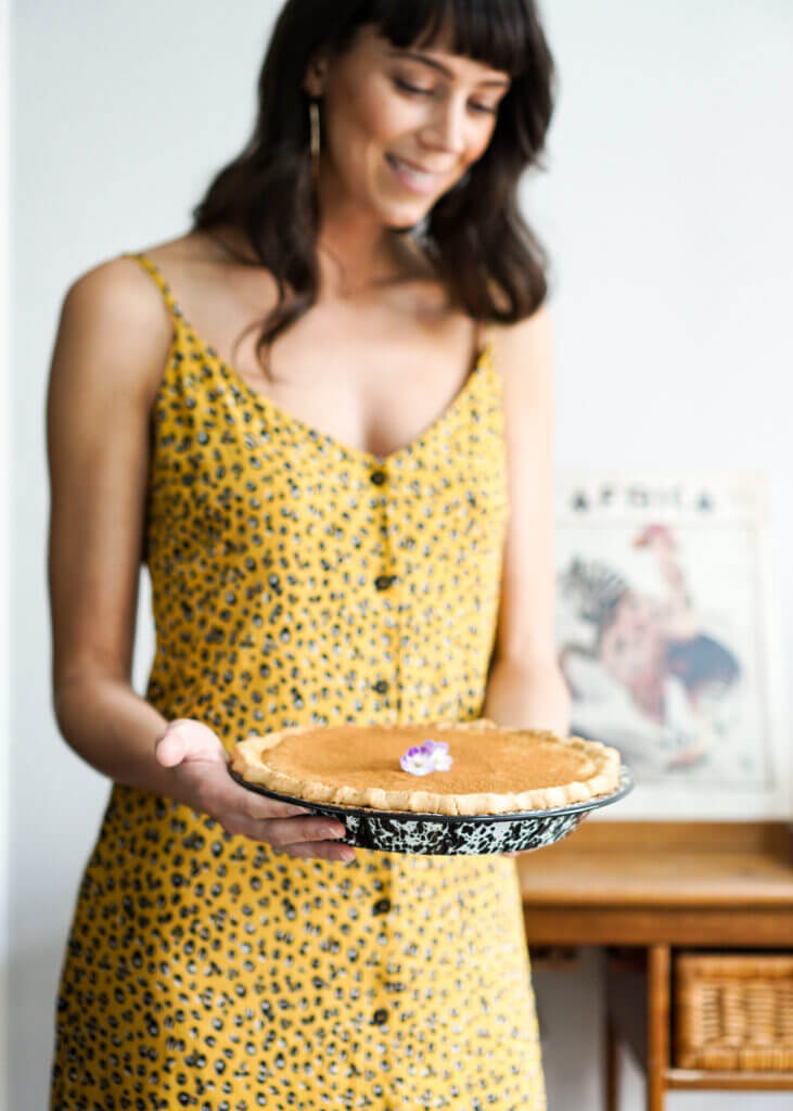 Baker Alie Romano with a South African Milk Tart